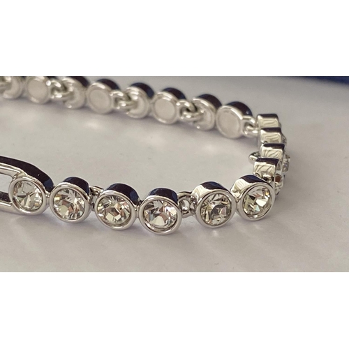 61 - Swarovski White Round-Cut Crystal Rhodium Plated Tennis Bracelet