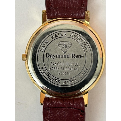 105 - Daymond Rene 24k Gold Plated Sapphire Watch