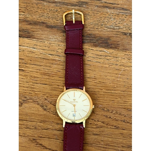 105 - Daymond Rene 24k Gold Plated Sapphire Watch