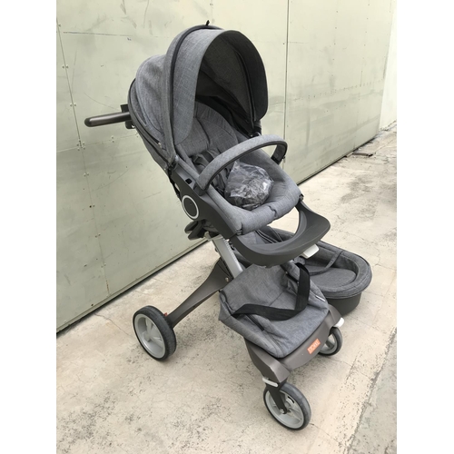 519 - Stokke Push Chair, Carry Cot Together with Cup Holder and Rain Protection