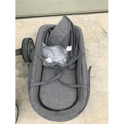 519 - Stokke Push Chair, Carry Cot Together with Cup Holder and Rain Protection