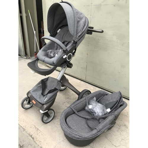 519 - Stokke Push Chair, Carry Cot Together with Cup Holder and Rain Protection