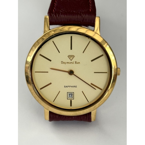 105 - Daymond Rene 24k Gold Plated Sapphire Watch