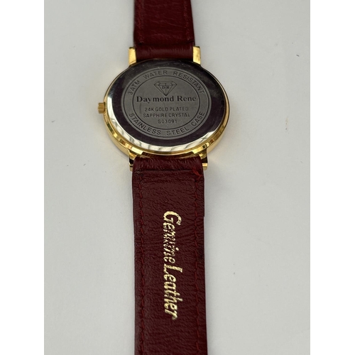 105 - Daymond Rene 24k Gold Plated Sapphire Watch