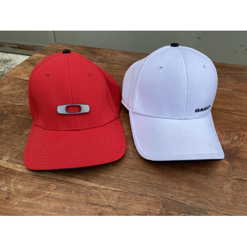 20A - x2 Oakley Baseball Caps. Red Size L-XL ,White Size S-M (Unused)