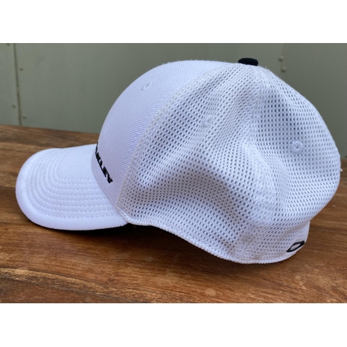 20A - x2 Oakley Baseball Caps. Red Size L-XL ,White Size S-M (Unused)