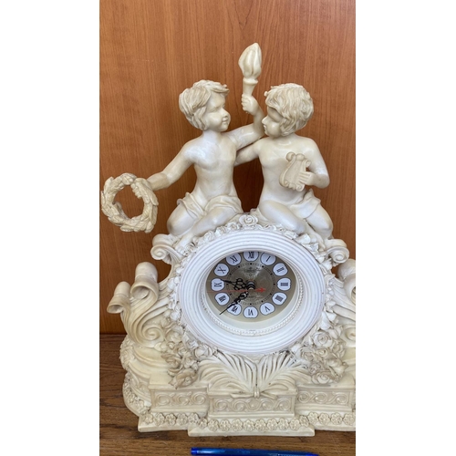 66 - French Style Cherub Mantle Clock (34cm L., 40cm H.)