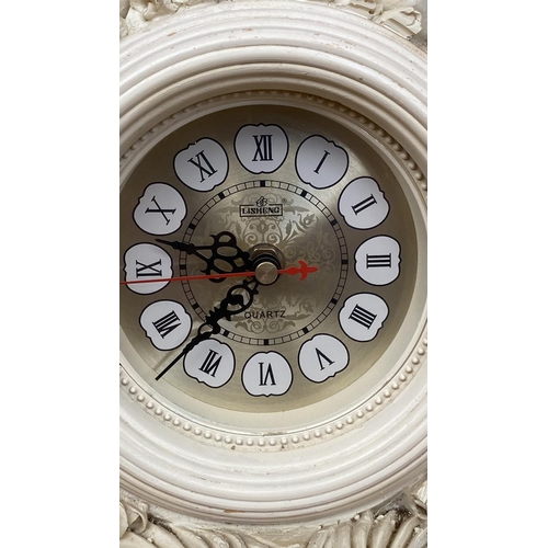 66 - French Style Cherub Mantle Clock (34cm L., 40cm H.)