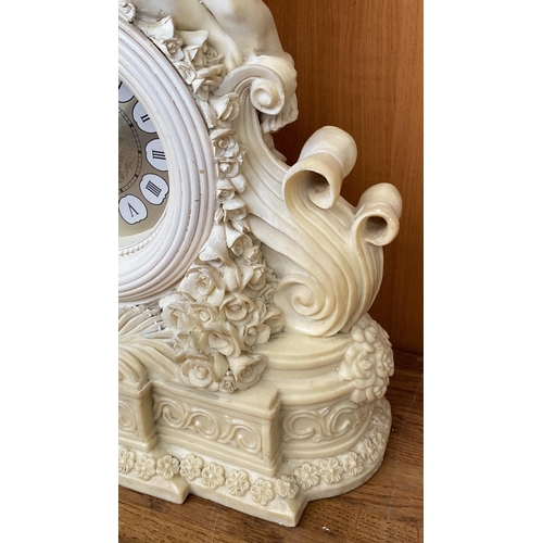 66 - French Style Cherub Mantle Clock (34cm L., 40cm H.)