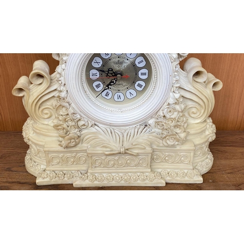 66 - French Style Cherub Mantle Clock (34cm L., 40cm H.)