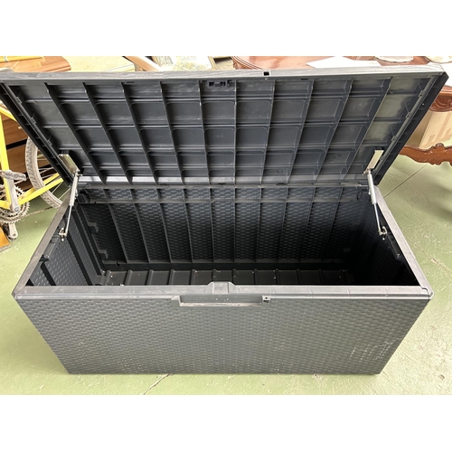 262 - Black Plastic Opening Up Storage Chest/Trunk (124 W. x 54 D. x 56cm H.)