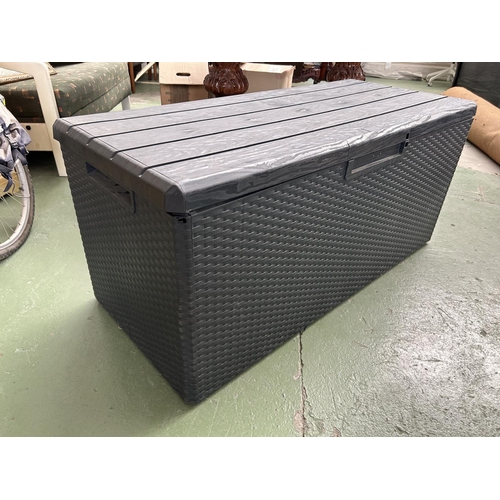 262 - Black Plastic Opening Up Storage Chest/Trunk (124 W. x 54 D. x 56cm H.)