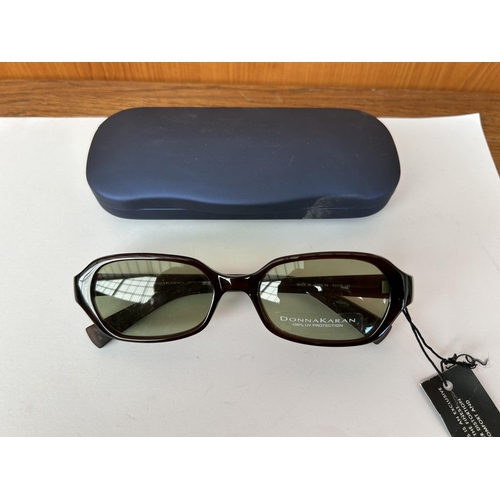 135 - Pair of Dona Karan Sunglasses (Unused)