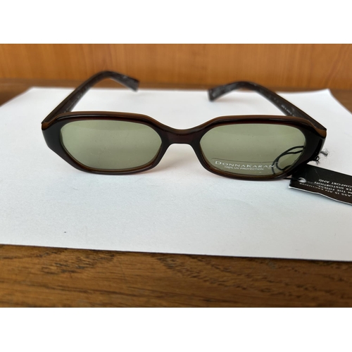 135 - Pair of Dona Karan Sunglasses (Unused)