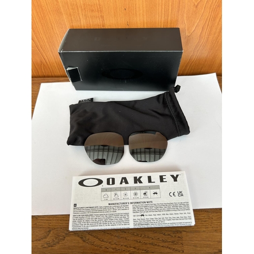 137 - Okley Prizm Black Polarized Sunglasses Lens (Unused)