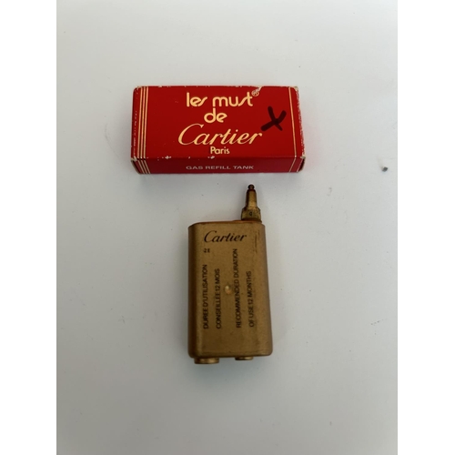 231 - Le Must De Cartier Gas Refill Bottle in Box (Very Small)