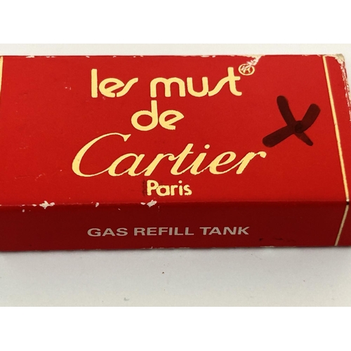 231 - Le Must De Cartier Gas Refill Bottle in Box (Very Small)