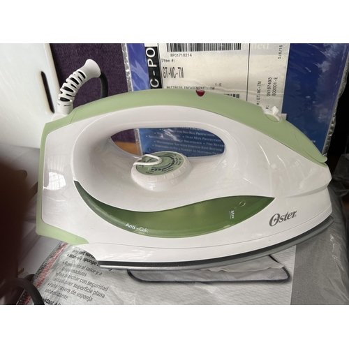 28 - Mattress Encasement, x2 Oster Steam Irons and x3 Ironing Blankets (Unused) - Code 'Welcome Kit'