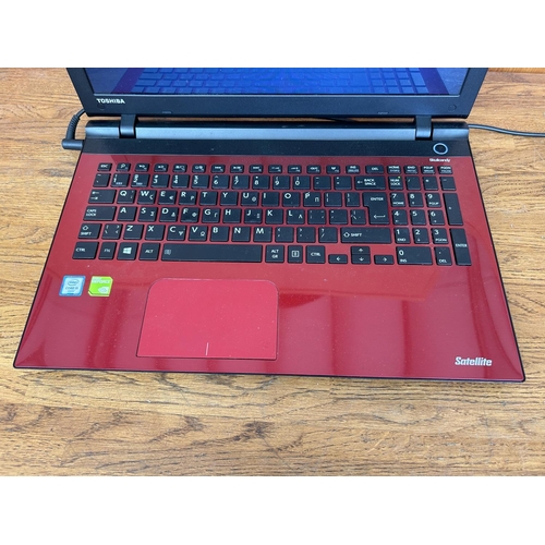 1 - Toshiba Satellite Skullcandy Laptop Computer (A/F - Hard Drive Removed) - Code AM6924H