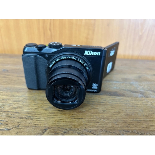 33 - Nikon Coolpix S9900 Black Color Digital Camera - Code AM6928V