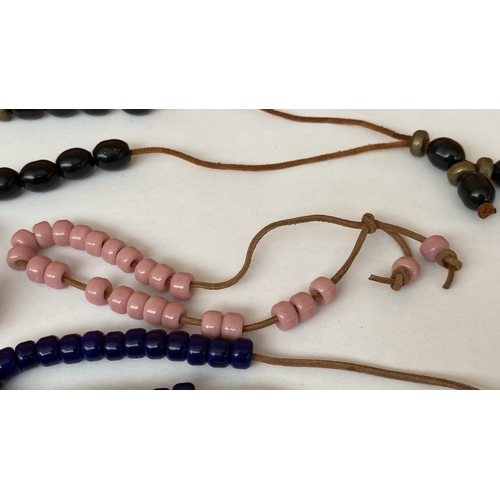 63 - Collection of 4 Worry Beads Komboloi with Leather Strings