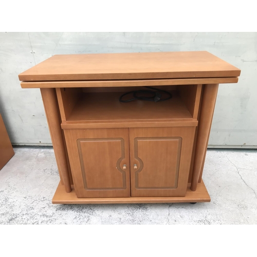 588 - Vintage 1970's TV Cabinet with Rotating Top on Castors (80 W. x 42 D. x 71cm H.)