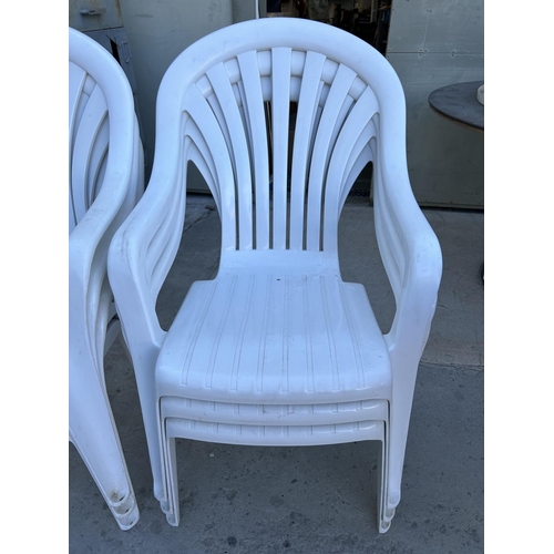 31 - Set of 6 White Plastic Garden Stacking Chairs