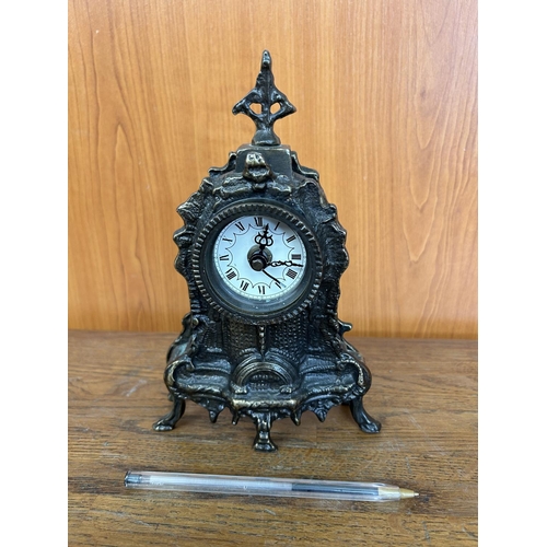 571 - Vintage Embossed Cast Iron Table Clock