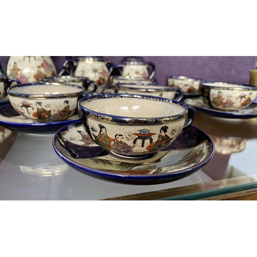 67 - Antique Japanese Satsuma 21-Piece Tea Service