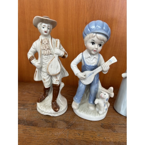 118 - Collection of 4 Vintage Porcelain Figurines