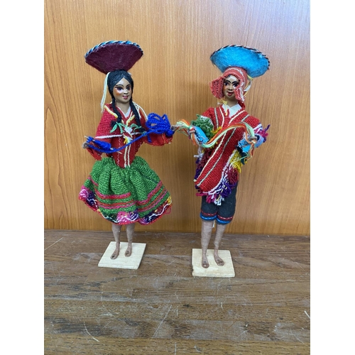 128 - Pair of Peruvian Dolls in National Costumes on Small Wooden Pedestal