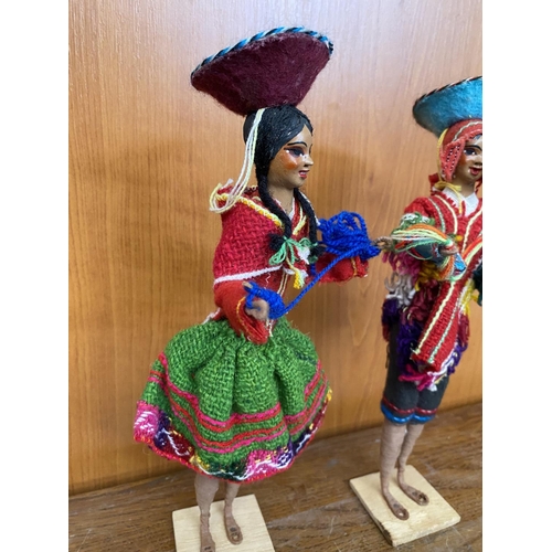 128 - Pair of Peruvian Dolls in National Costumes on Small Wooden Pedestal