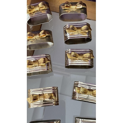 100 - x26 Vintage Unbranded Silver Plated and Gilt Napkin Ring Holders Together Silver Plated Cake Server