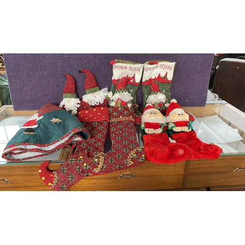 95 - Lot of Christmas Stockings and Tree Skirt