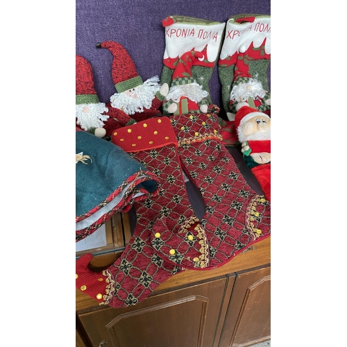 95 - Lot of Christmas Stockings and Tree Skirt