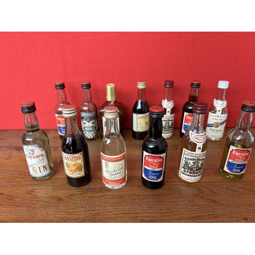 505 - Collection of 13 Miniature Spirit Bottles (Content May Not Be Drinkable)