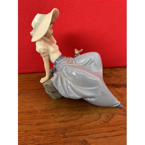 9 - NAO by Lladro Figurine of Seated Girl and Bird