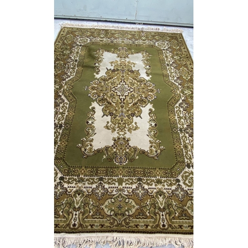 49B - Europ 100% Pure Wool Green Carpet (140 x 200cm)