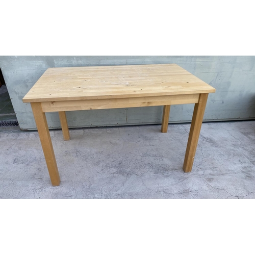 598 - 'Ikea' Light Color Kitchen Table (119 W. x 74 D. x 75cm H.)