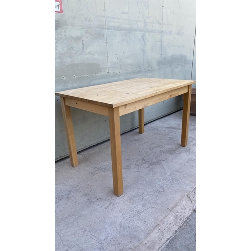 598 - 'Ikea' Light Color Kitchen Table (119 W. x 74 D. x 75cm H.)