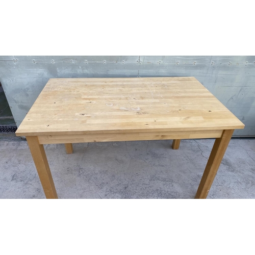 598 - 'Ikea' Light Color Kitchen Table (119 W. x 74 D. x 75cm H.)