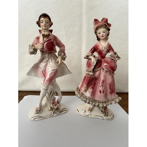 496 - Pair of Porcelain Figurines (A/F - 22cm H.)