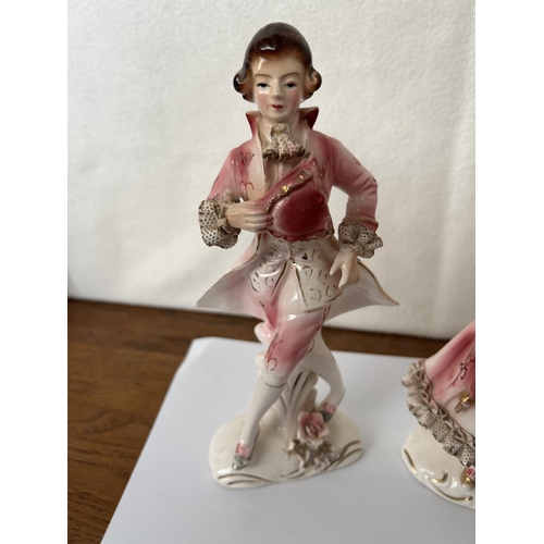 496 - Pair of Porcelain Figurines (A/F - 22cm H.)