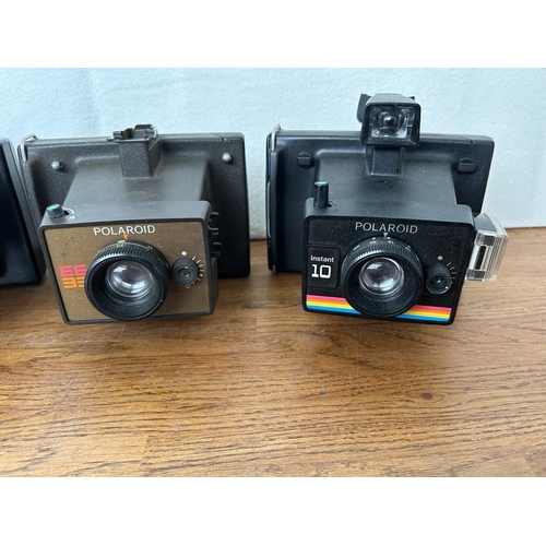 97 - Collection of 3 Polaroid Cameras (A/F)