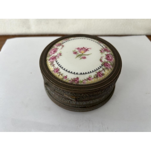 572 - Vintage Brass Trinket Box with Flowery Design Ceramic Top