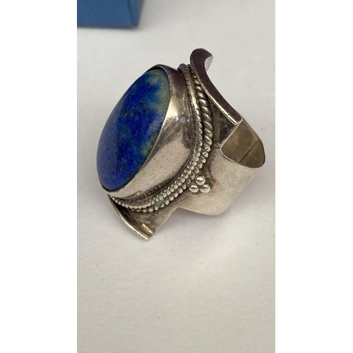 58 - Sterling Silver Lapis Lazuli Saddle Ring Surrounded by Silver Rope Decoration