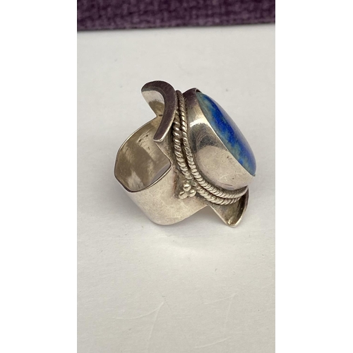 58 - Sterling Silver Lapis Lazuli Saddle Ring Surrounded by Silver Rope Decoration