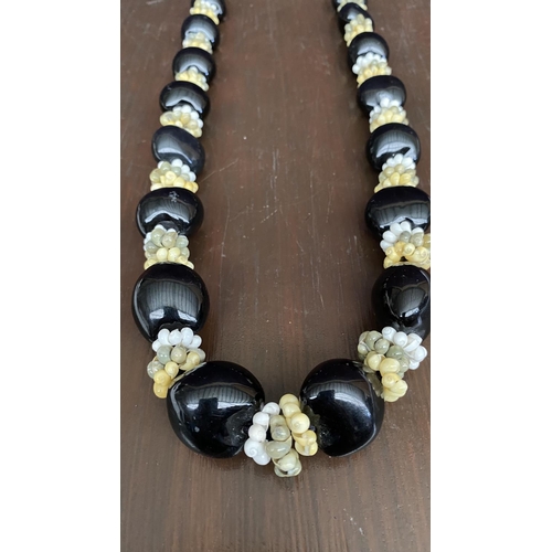 74 - Genuine Kukui Tree Nuts Long Necklace with Cowrie Shells and Satin Ribbon