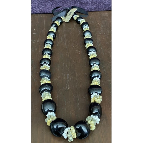 74 - Genuine Kukui Tree Nuts Long Necklace with Cowrie Shells and Satin Ribbon