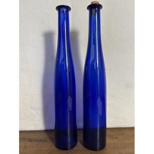 93 - Two Blue Long Neck Bottles